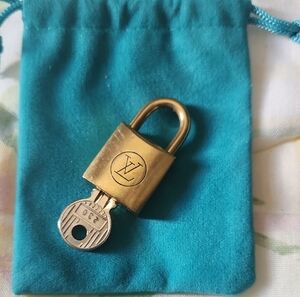 Louis Vuitton Gold-Tone Padlock with Silver Key on Teal Pouch
